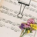 small-bright-flowers-branches-music-sheet_23-2148043964